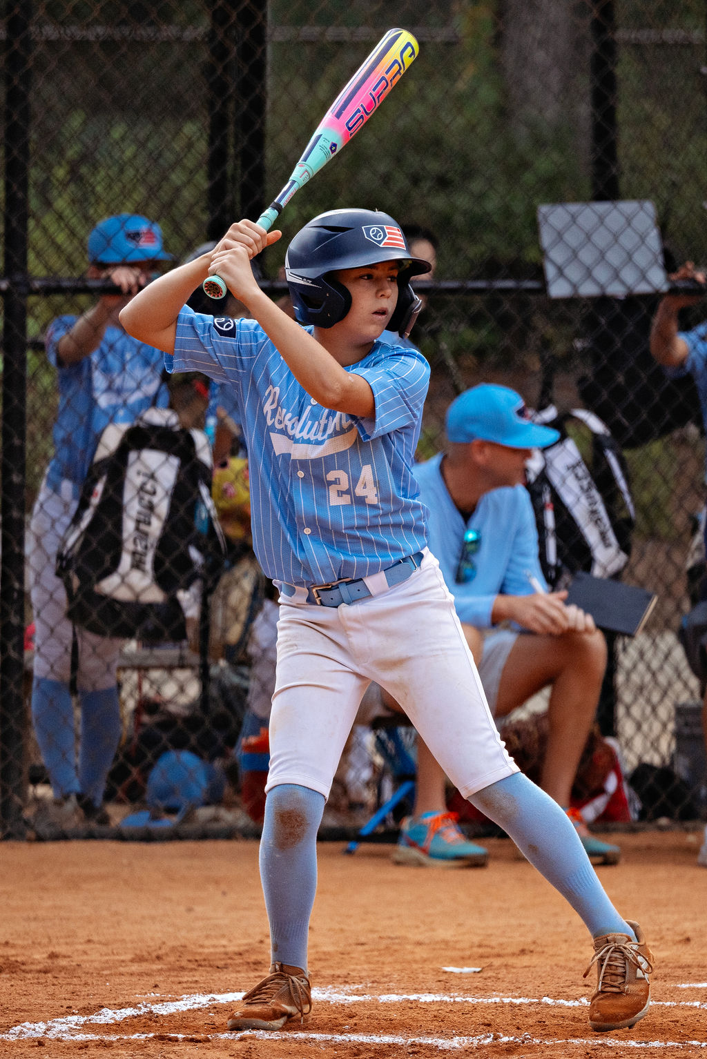 Brooks Benson in the Revolution’s blue pinstripe uniform at Cherry Park.